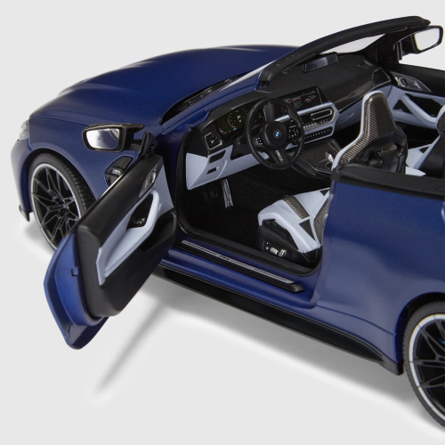 Miniatura BMW M4 Cabrio G83 1:18 – Frozen Portimao Blue, Minichamps