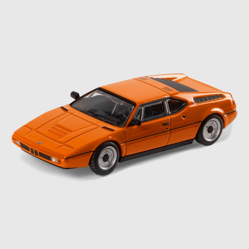 Miniatura BMW M1 E26 1:64 – pomarańczowa, Almost Real